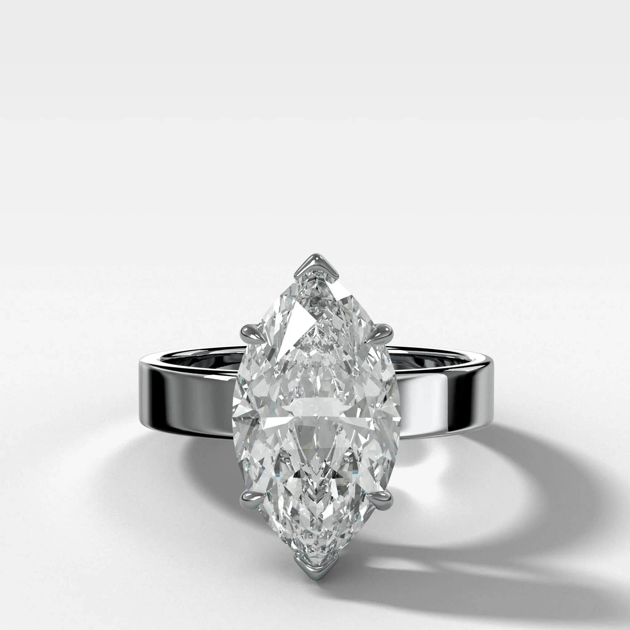 Finest Solitaire Engagement Ring With Marquise Cut Diamond