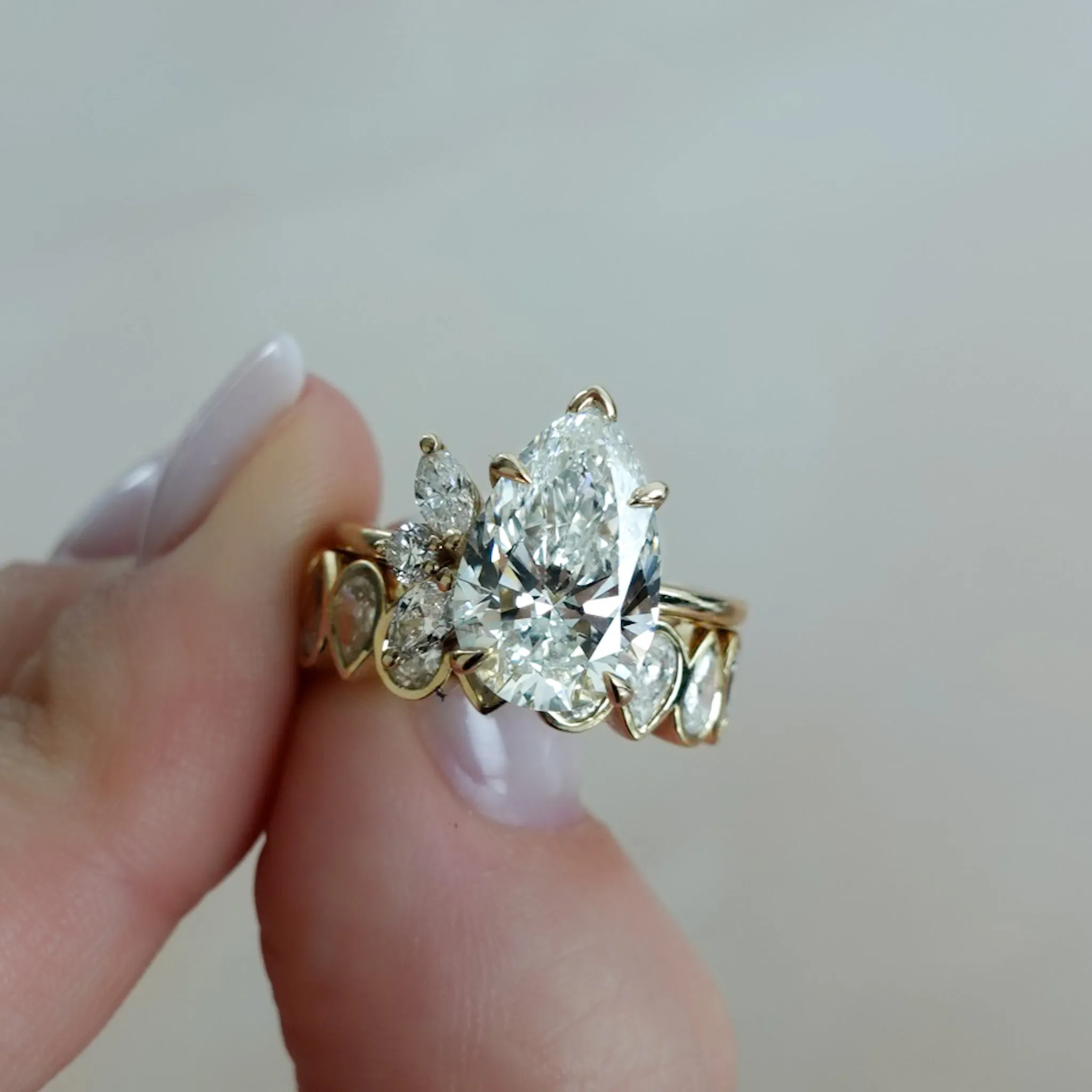 Midi Bezel Set Eternity Band With Alternating Pear Cuts