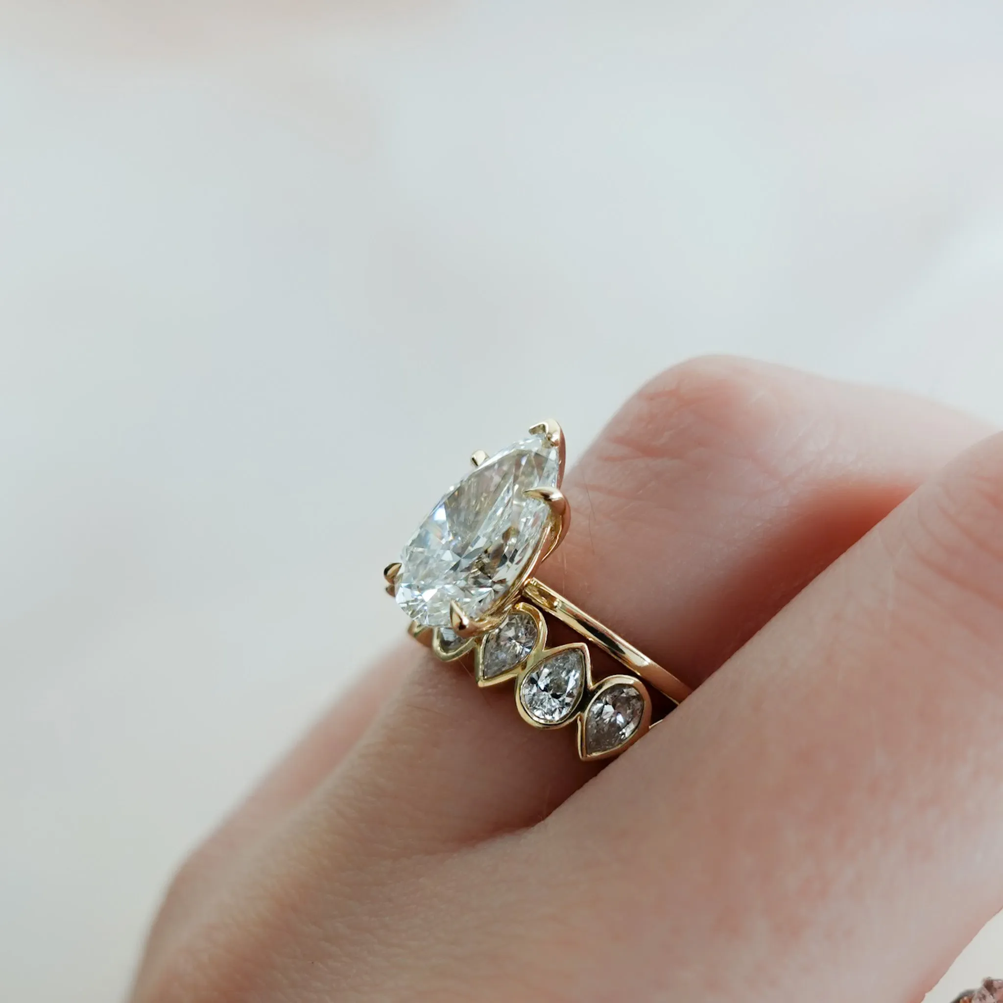 Midi Bezel Set Eternity Band With Alternating Pear Cuts