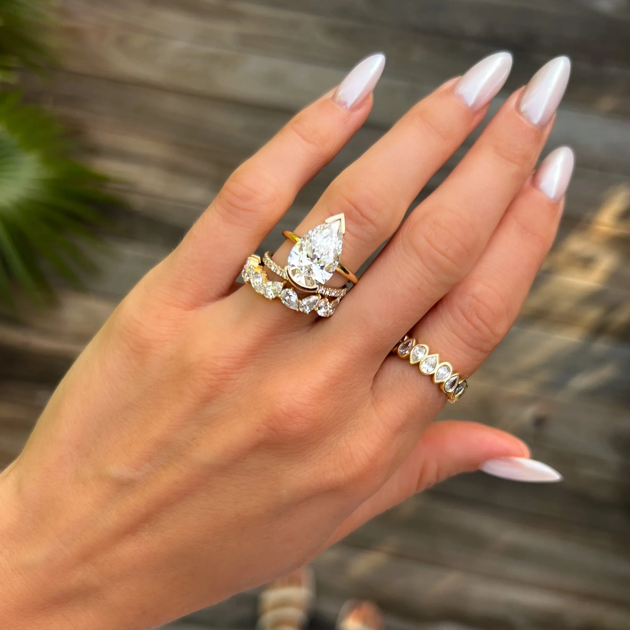 Midi Bezel Set Eternity Band With Alternating Pear Cuts