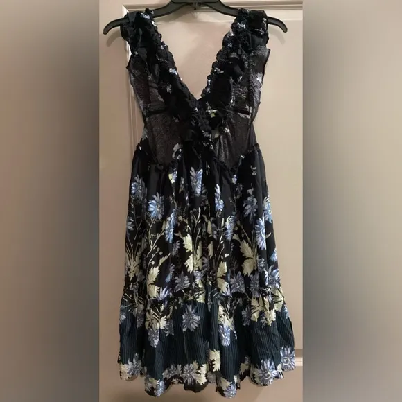 NWOT Free People Bali Wild Daisy Slip Dress in color Black Combo Medium