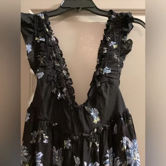 NWOT Free People Bali Wild Daisy Slip Dress in color Black Combo Medium