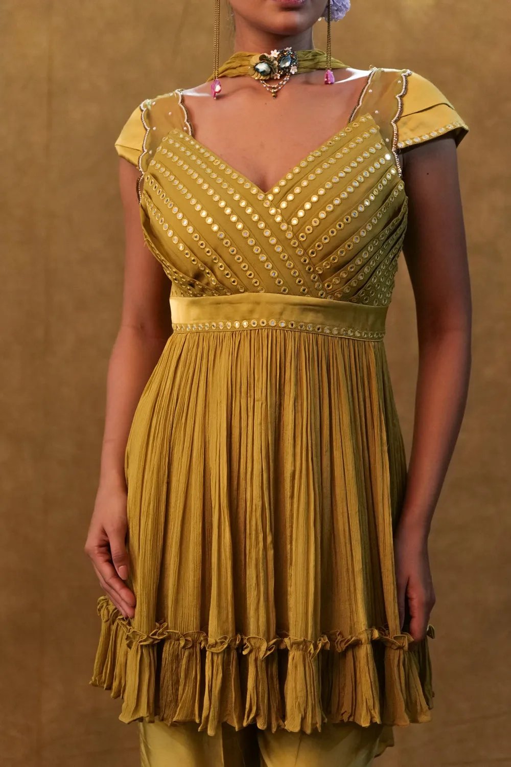Olive Peplum Set Paired With Pants And A Neck Dupatta